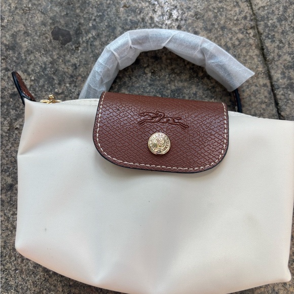 Longchamp Handbags - Longchamp Cream Shoulder Bag with Brown Flap